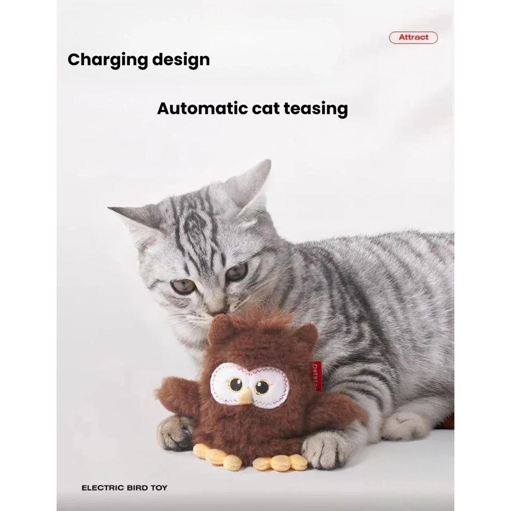 Cat playing with the moving Petstar owl toy