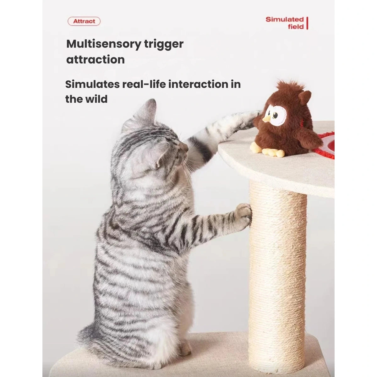 Cat batting the electronic owl toy beside a scratching post