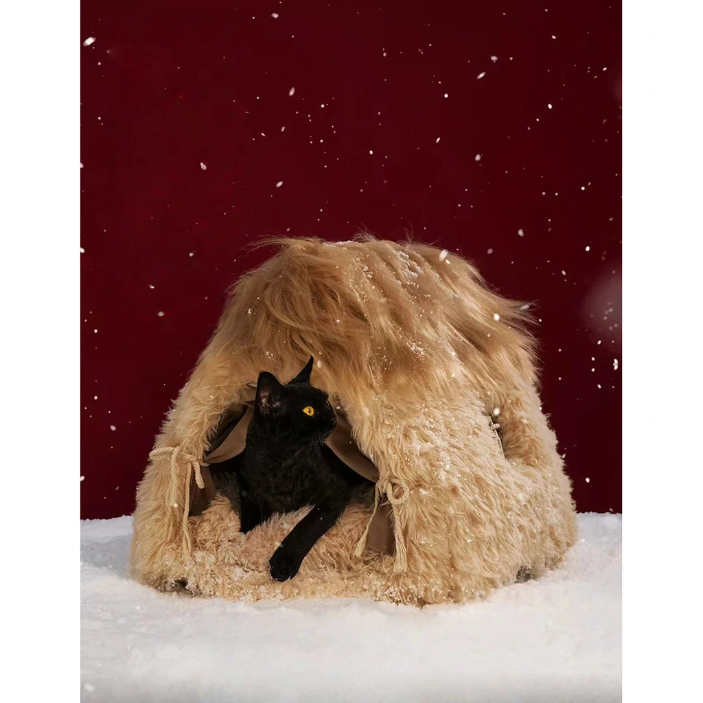 Cat sitting in the Petstar brown cat cave