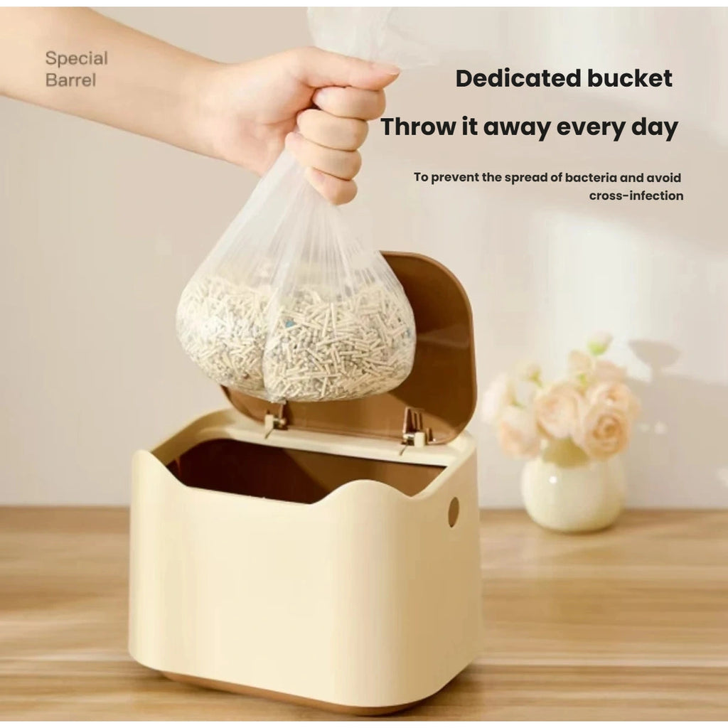 Removable inner bucket lifted from the cat litter waste bin