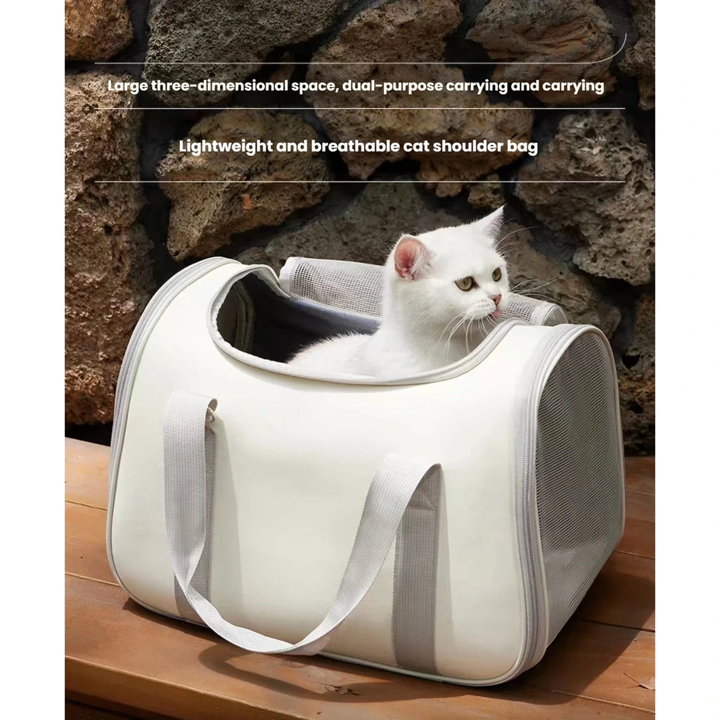 Cat resting inside the white soft-sided carrier bag