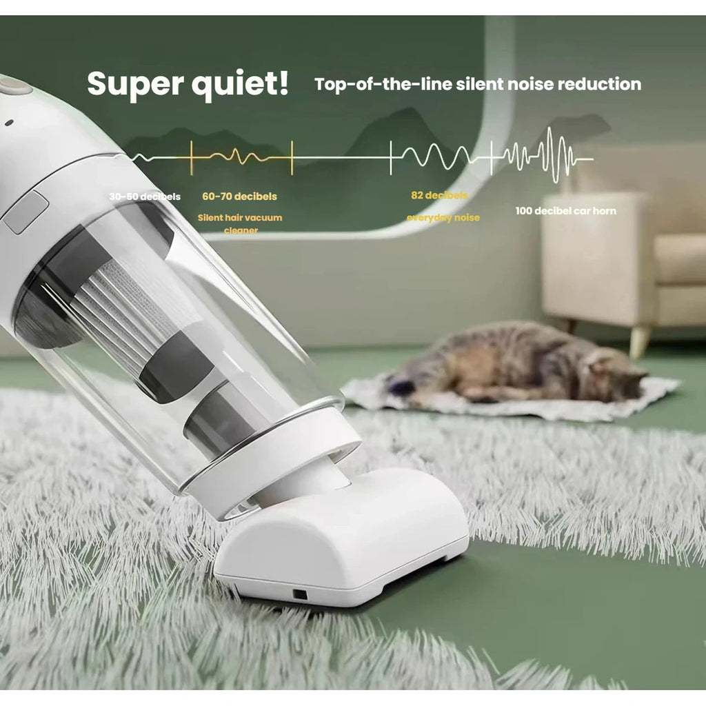 Handheld pet hair vacuum shown beside a sleeping cat